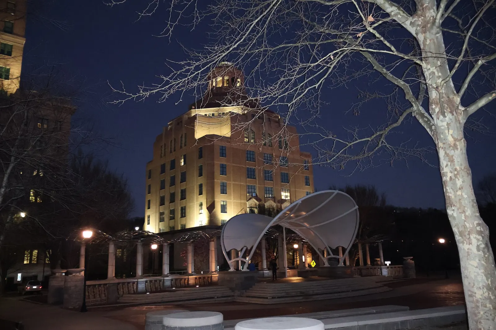 Asheville City Hall at night, seen from Pack Square Park.