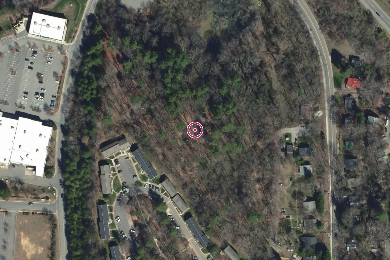 Aerial view around 110 River Hills Road, with a circle at the address.